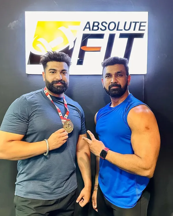 Meet Ranjodh, our Sheru Classic Powerlifting Champion. He represents the strength and determination we foster at Absolute Fit, bringing home the gold and showing what's possible with dedication.
