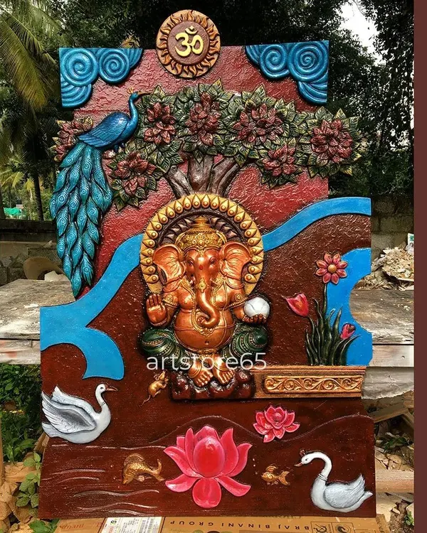 This large, handcrafted Ganesha mural is one of our proudest creations. Made from durable fibre-reinforced plastic (FRP), it's designed to be a stunning centerpiece for an exterior wall or a large hall, featuring vibrant, hand-painted details from the Om symbol to the lotus flowers below.