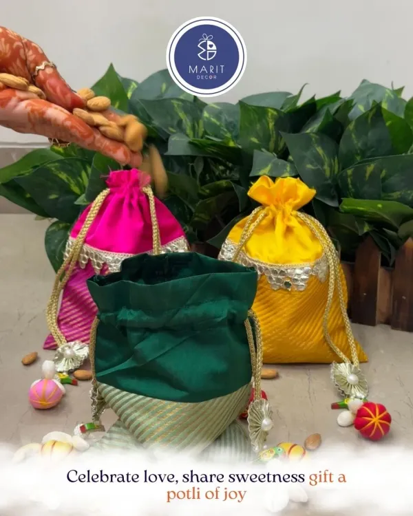 Celebrate love, share sweetness, and gift a potli of joy. Here, a hand filled with almonds pours them into one of my vibrant handcrafted potlis, ready to be gifted.
