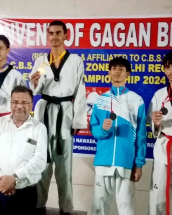 Ansh Sharma stands proudly on the podium after winning the Gold medal at the CBSE Central Zone Taekwondo Championship 2024. This victory secured his spot in the CBSE Nationals.