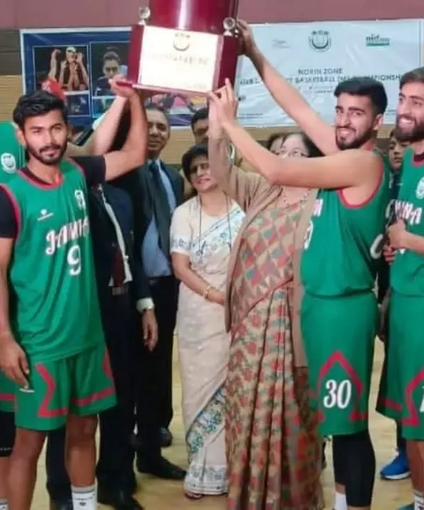 The championship moment for the Jamia men's basketball team at the North Zone Inter-University Championship. We managed this 64-team tournament, culminating in a victory for the home team in our indoor stadium.