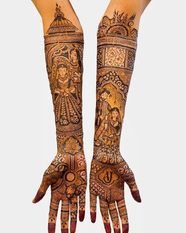This full bridal henna tells a family's story. On one arm, I created a portrait of the bride with her mother, and on the other, a portrait of her with her father and sister, capturing a precious family bond forever in her wedding mehndi.