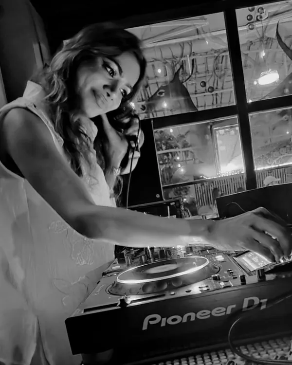 A black and white shot of me in the zone at a 'Homie' night. It's all about that classic, intimate vibe.