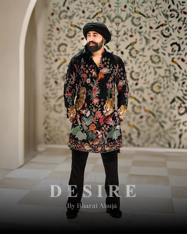 This is what it means to wear art. I designed this custom kurta with intricate floral and tiger motifs to create a look that is both regal and fierce. It is a statement of power, crafted for the man who is unafraid to stand out.