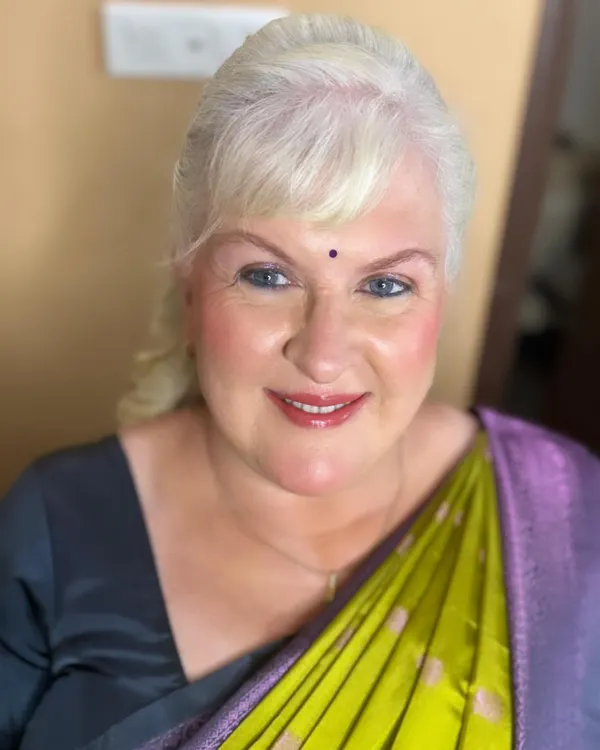 Another beautiful look for this client. Here we paired a different saree with a soft, glowing makeup look that highlights her features and gives her a fresh, youthful radiance.