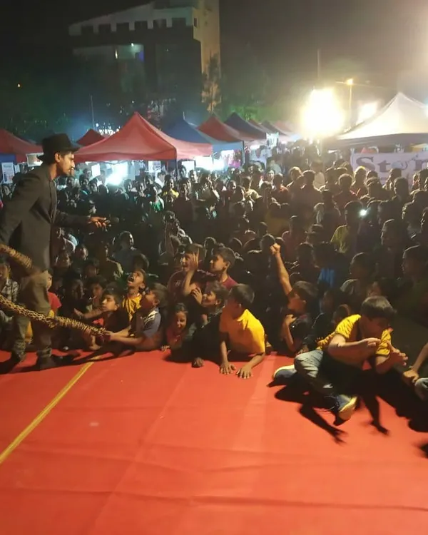 Here's another angle from a large outdoor festival, right in the middle of an interactive routine with the audience. Engaging directly with the crowd, even on a big stage, is key to making everyone feel involved in the magic.
