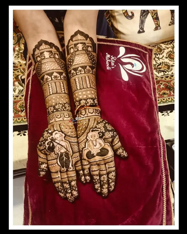 A special mehendi design for a mother celebrating her son's Munj, or thread ceremony. The palms feature a 'batu' (young Brahmin boy) and other traditional elements.