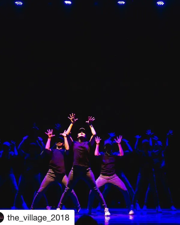 Our crew, House of Dance, performing on stage at "The Village 2018". This photo captures the swagga and bright energy we bring to every community performance.