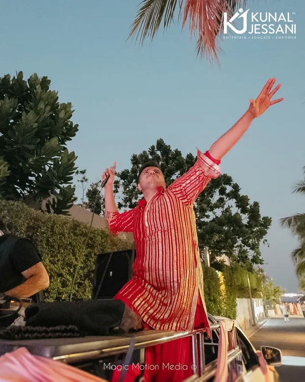 Taking the Baraat energy international! Here I am, on top of the car, hyping up the crowd at a stunning destination wedding in Thailand. No matter the location, the vibe is always 100%.