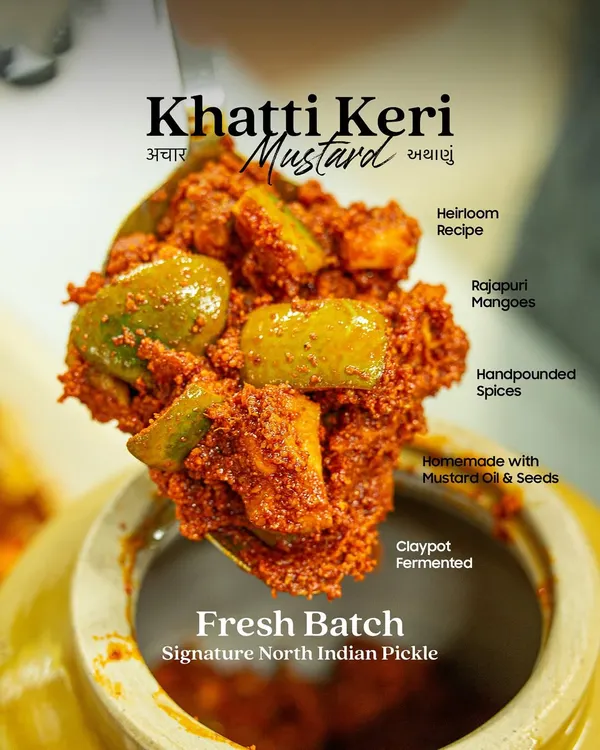 A spoonful of our signature Khatti Keri Mustard pickle. Made with an heirloom recipe, we use fresh Rajapuri mangoes, hand-pounded spices, and cold-pressed mustard oil, all fermented in clay pots for that deep, authentic flavour.