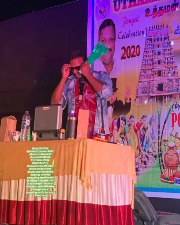 Performing on stage for a large audience during a Pongal festival celebration. I customize my magic to fit cultural events, ensuring the entertainment connects with the theme and the spirit of the celebration.