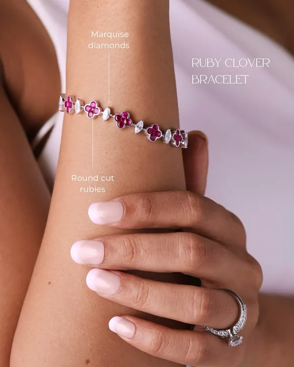 The Ruby Clover Bracelet is a beautiful example of wearable luxury. It combines the vibrant color of round-cut rubies with the sparkle of marquise diamonds, creating a piece that is both delicate and striking.
