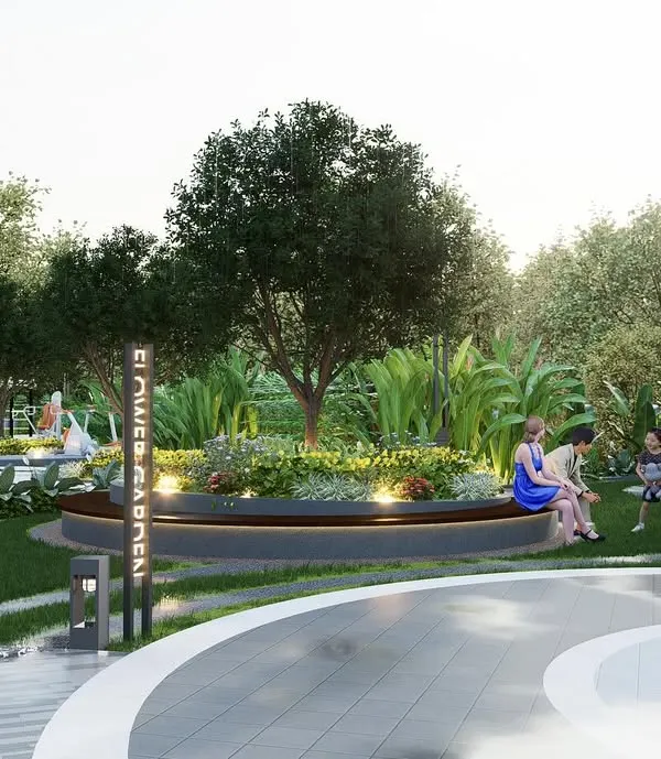 A view of the 'Flower Garden' at a Sattva Group project, featuring a circular bench integrated into a raised planter. This space is designed as a social hub, with curved pathways and layered plantings creating a soft, organic feel for residents to gather and relax.