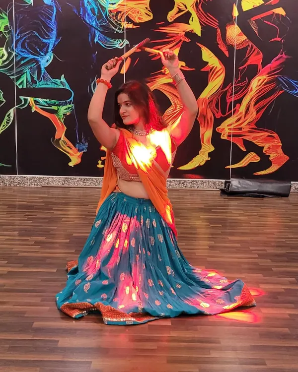 A beautiful moment from our Garba night celebrations. I love dressing up and dancing with my students during the Navratri festival.
