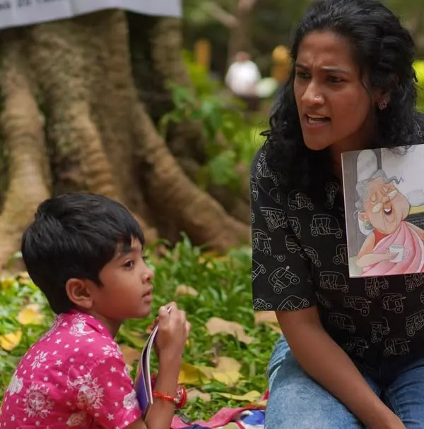 This is the magic I live for. A moment of shared wonder as we dive into a story together, with little ones completely absorbed in the tale. Our outdoor storytelling sessions are all about creating these intimate, focused moments of connection.