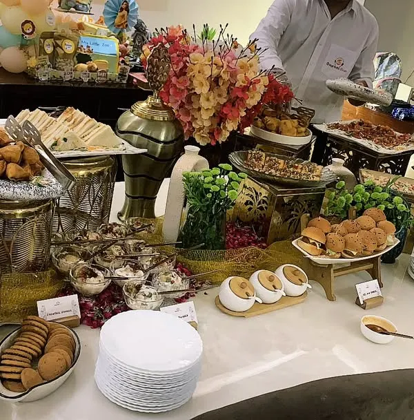 A feast for the eyes and the soul. This is a look at one of our vibrant grazing tables, loaded with a variety of gourmet snacks, fresh fruits, and decadent desserts, perfect for making any celebration feel special.