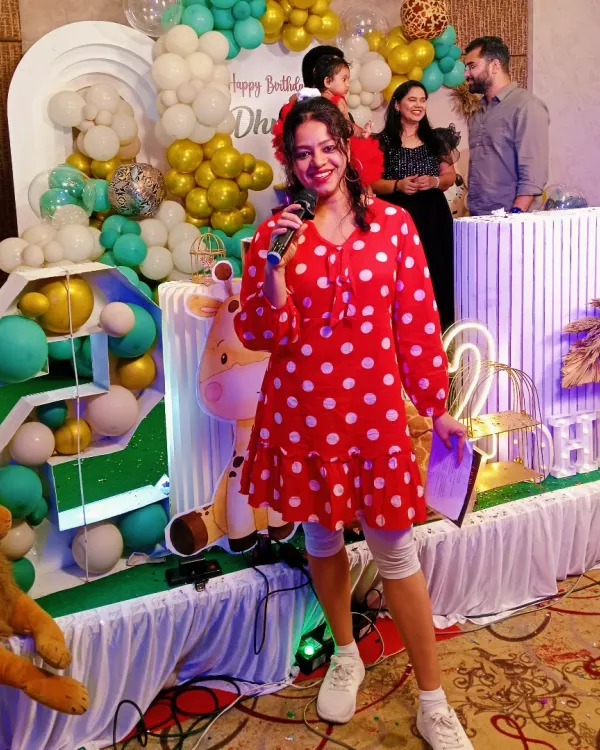 I believe every party should be full of life, and this jungle-themed birthday was no exception. Here I am, mic in hand, ready to kick off the fun and games for the kids and family.