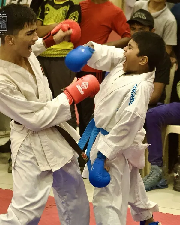 This is what it's all about. Two young warriors, focused and fierce, putting their training to the test in a kumite match. We teach not just how to strike, but how to respect the art and your opponent.