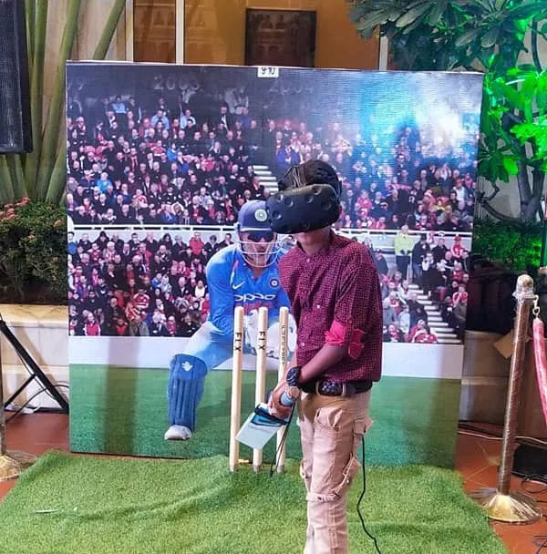 A full VR cricket setup for an ICICI corporate event. The experience includes a large backdrop, spectator screen, and professional stanchions to create an authentic and premium feel for your guests.
