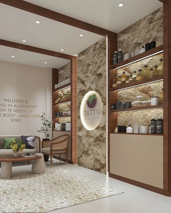This is the welcome area of the Tattva Wellness Spa, designed to immediately ground visitors. We used natural stone, warm wood, and a clear brand message to create a space that speaks to body, mind, and spirit alignment.