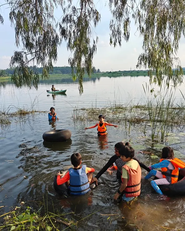 Our classroom has no walls. Here, children experience the pure joy of learning and playing in a local lake, an activity that builds confidence and a deep, personal connection with the natural world.