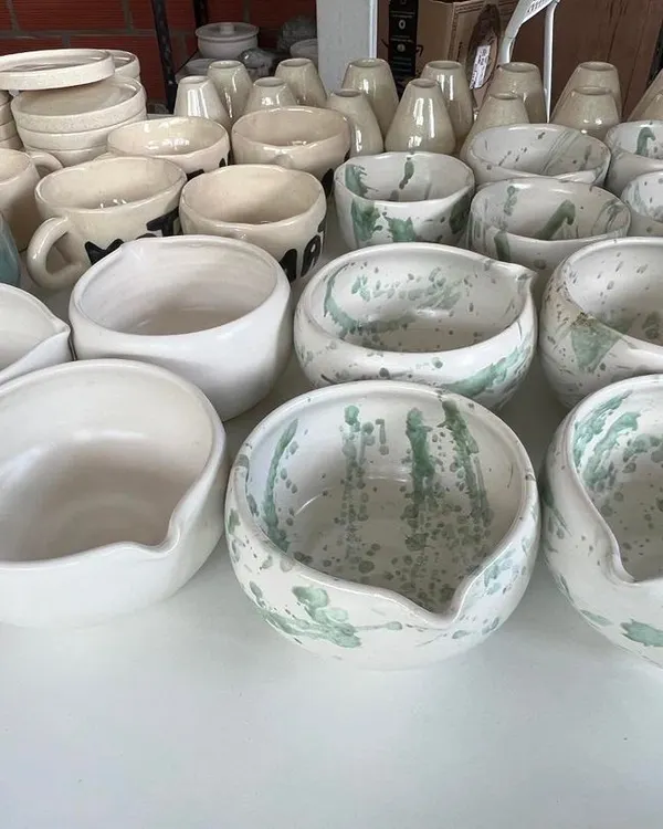 This was a large and exciting order for a matcha tea bar. I made everything from splash-glaze bowls to hand-pinched mugs and pourers.