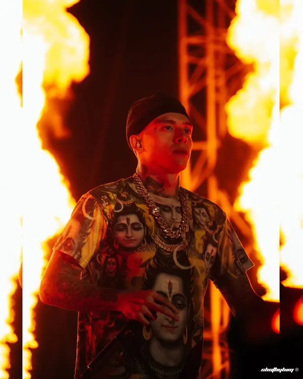 Central Cee commands the stage at Rolling Loud India, framed by explosive pyrotechnics. This shot captures the raw energy and spectacle of a headline performance, freezing a peak moment with perfect timing and intense lighting.