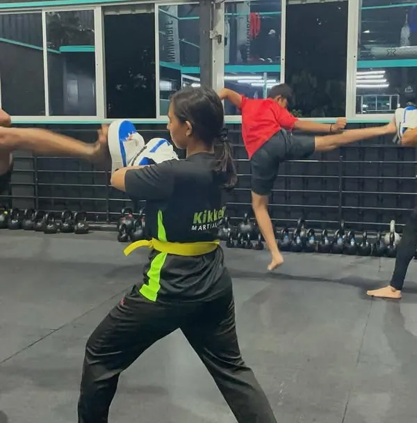 Double trouble. Two of our students perfectly synchronized during a kicking drill. It's moments like these that show how connected our group is.