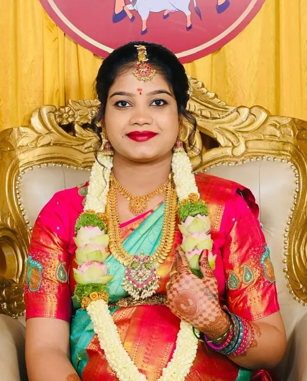 Our beautiful mom-to-be, Navya, celebrating her baby shower. She chose a simple yet elegant gold-finish temple jewellery set that perfectly complements her vibrant silk saree.