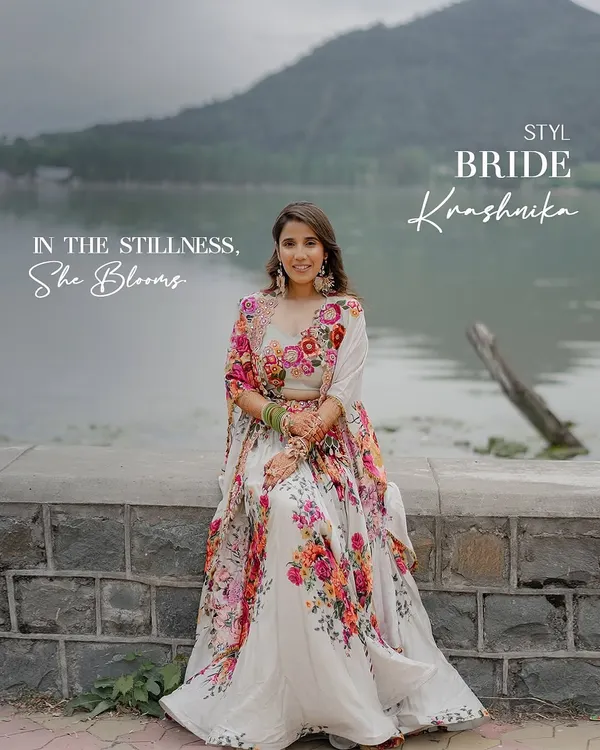 In the stillness of the morning by Dal Lake, our bride Krashnika blooms in a floral Gazal Gupta lehenga for her Haldi ceremony. The look is graceful, radiant, and a perfect reflection of the serene beauty surrounding her.