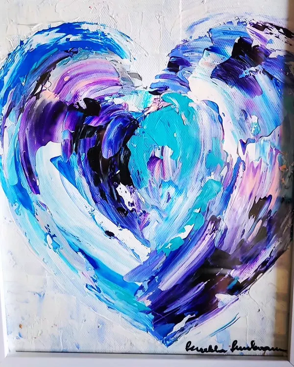 This piece, with its swirling blues and purples, is about the many forms love takes. I use a palette knife to build up thick layers of paint, creating a sense of depth and movement. It’s a bold, contemporary heart painting that makes a statement.