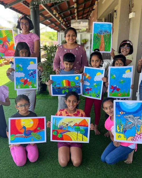 This is what pure joy looks like! We love seeing our campers proudly show off the vibrant masterpieces they created. Our art camps are all about exploring color, learning new skills, and making friends in a fun, supportive environment.
