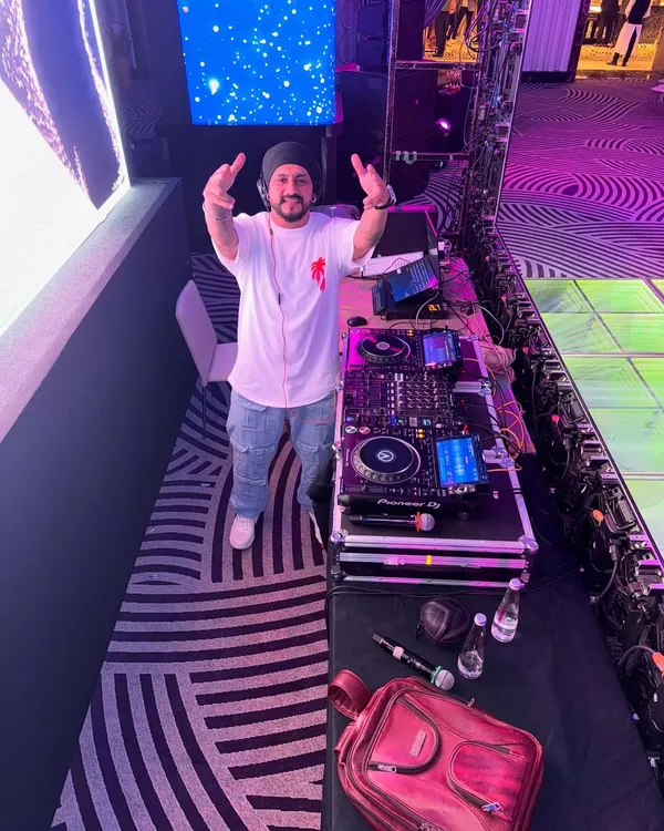 All set for a Friday night corporate gig. From my high-end Pioneer DJ setup to the massive LED screen in the background, every element is in place for a memorable event.
