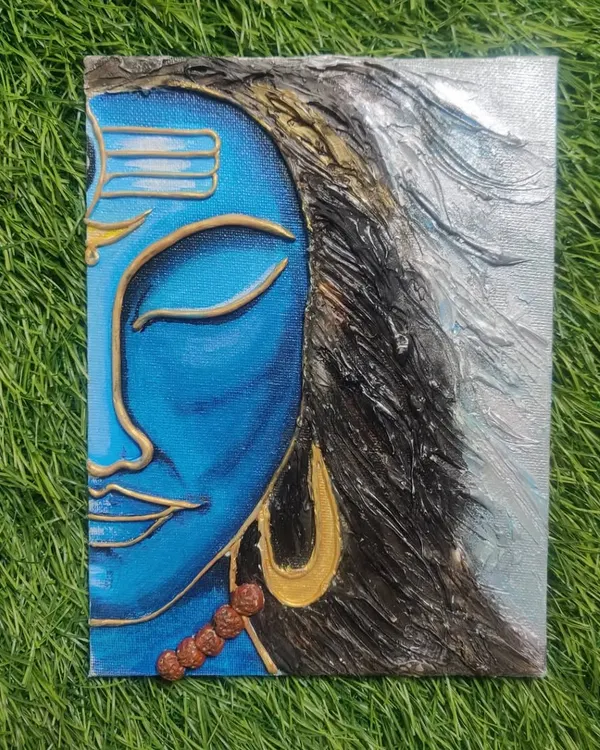 This textured canvas painting captures the tranquil face of Lord Shiva. I used clay and acrylics to create a 3D effect on his hair and features, making it a powerful piece for meditation.