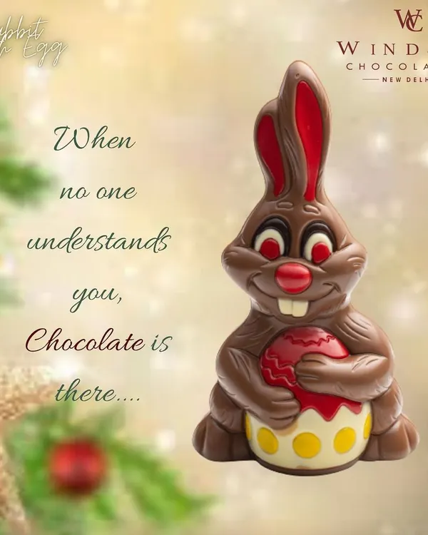 My Easter Bunny chocolate figure, holding a decorated egg. This piece uses milk, white, and colored chocolate for a festive look.