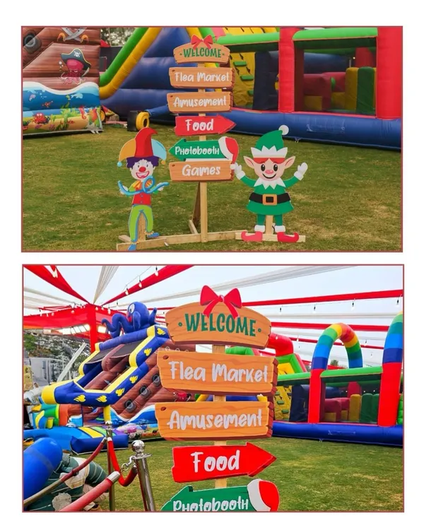 Directional signs for a large Christmas carnival, pointing guests towards the Flea Market, Amusement rides, Food stalls, and Games. I handle all aspects of large-scale event management.