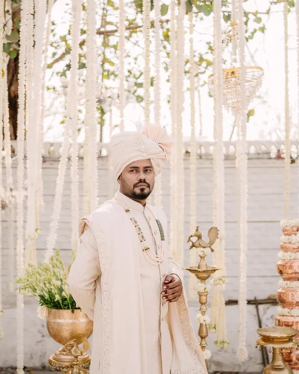 A stylish portrait of the groom, looking sharp and ready for the main event. I focus on capturing a sense of confidence and anticipation.