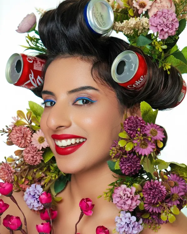 This is what happens when you say "let's do something crazy". We took some Coke cans and flowers and made art. This is the kind of creative energy I bring to every portfolio shoot.