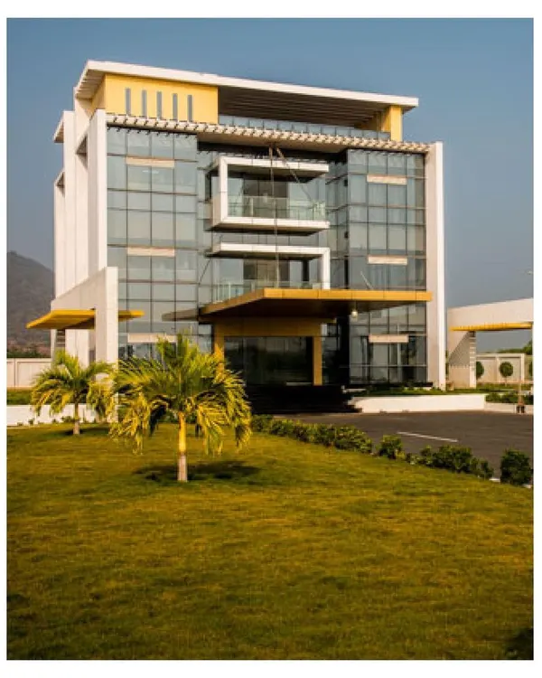 This is the Admin Block for the Krishna Sai Granites industrial campus. We designed this 3-storeyed contemporary building to be a dominant, signature feature on the 9.5-acre site, giving the campus a strong identity beyond its functional purpose.