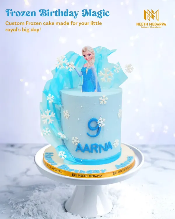 Frozen birthday magic for Aarna's ninth birthday. This cake features an elegant Elsa, sugar snowflakes, and a beautiful sail of pulled sugar.
