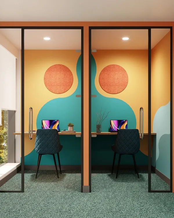 We create solutions for both group work and individual focus. These colorful, art-inspired acoustic pods offer a quiet, private space for concentration or one-on-one calls, blending seamlessly into the office aesthetic while providing essential functionality.