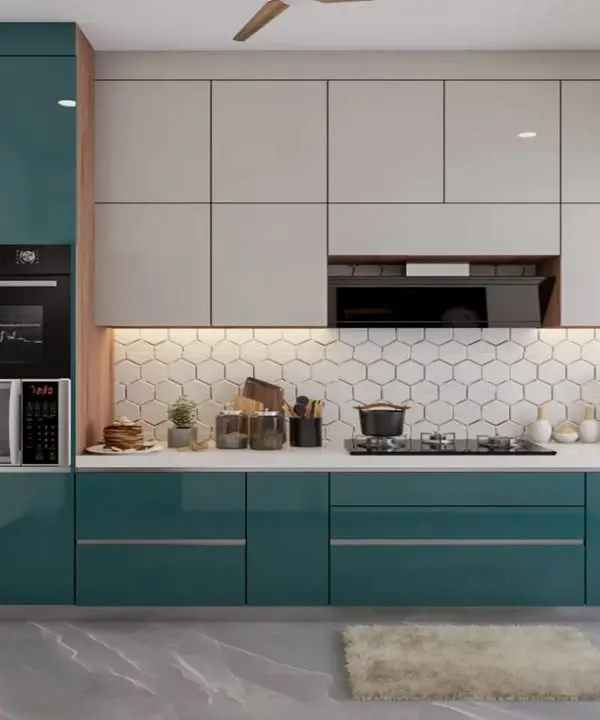 A 3D design showcasing a modern kitchen with teal and light grey glossy cabinets. The hexagonal tile backsplash and integrated tall unit for appliances were planned to create a stylish and functional space.