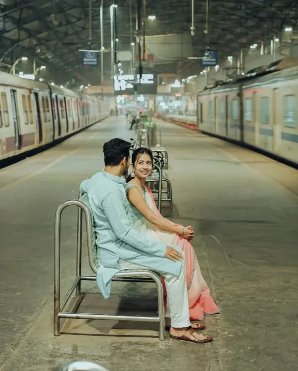 A quiet moment on a bustling Mumbai train platform. I love creating unique pre-wedding stories that reflect a couple's journey, turning everyday locations into a cinematic backdrop for their love.