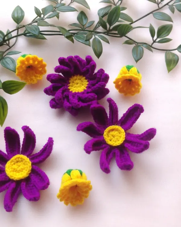 A new project is in progress. I am working on some new flower designs in purple and yellow. I am excited to see how these will turn out.