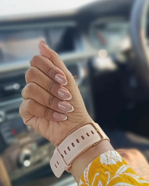 A perfect example of how a classic French manicure looks in the real world. This clean and elegant design on almond-shaped nails is timeless. I use high-quality gel polish to make sure the white tips are crisp and the nude base is flawless.