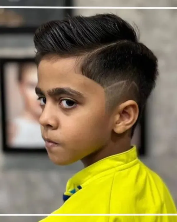 This young man is rocking a super cool haircut with a sharp side design. We love creating fun and trendy styles for our little clients.