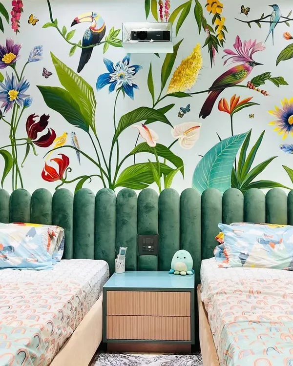 This summery tropical mural was a massive project that I'm so proud of. I used matte acrylics to bring this vibrant scene to life in a kids' bedroom, turning the entire wall into a piece of art.