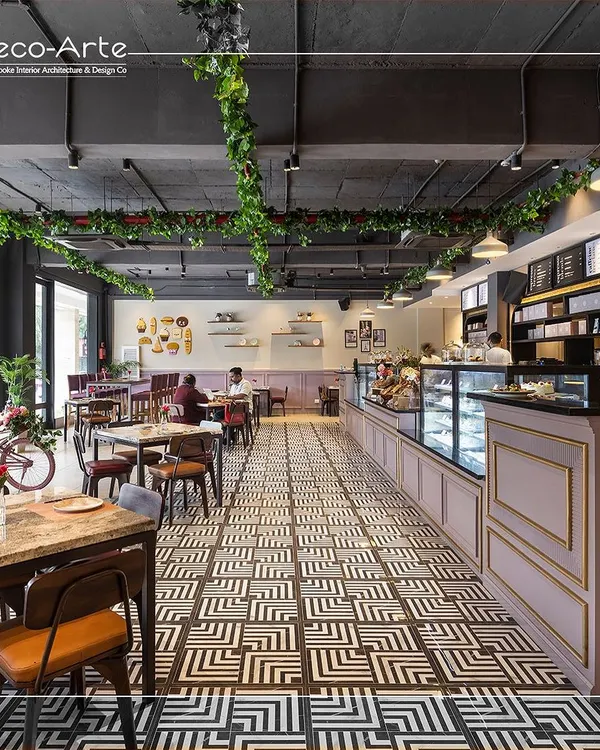 Step into a world of elegance at Amelia, where every corner tells a story of refined design and modern luxury. The geometric floor tiles and lush greenery create a lasting impression.