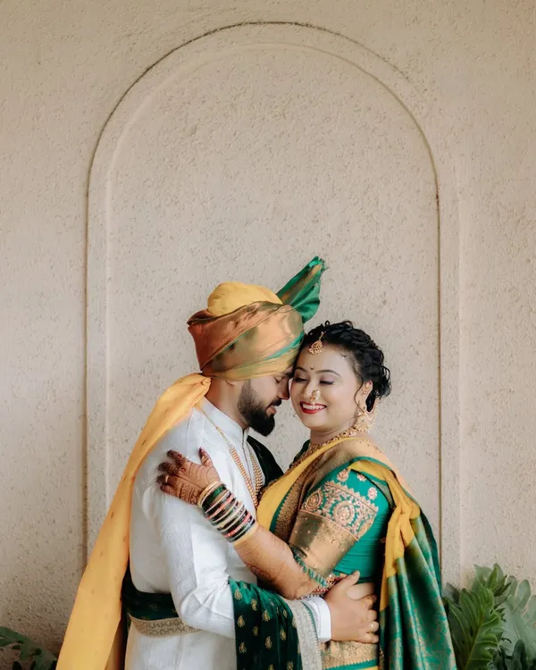 An intimate and heartfelt embrace between the bride and groom in their stunning Maharashtrian wedding attire. These are the quiet, emotional moments I cherish capturing.