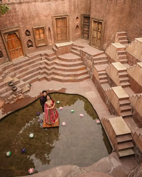 This is the kind of magic I love to create. We were at the Anokhi Baoli, and the sheer scale of the ancient stepwell felt like the perfect backdrop for their grand love story. A pre-wedding shoot like this is more than just photos; it's about creating a timeless piece of art that tells your story.